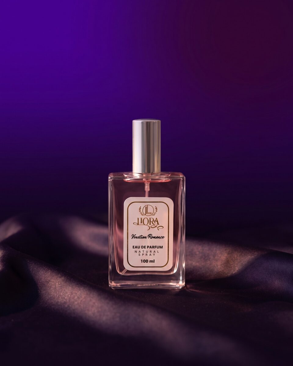 Venetian Romance Eau de Parfum, blush bottle on dark satin in evening light